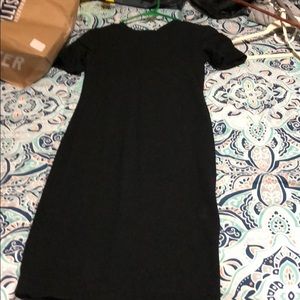 Fitted black dress with sleeves